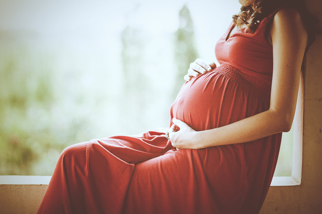 Mulher grávida, representando licença maternidade